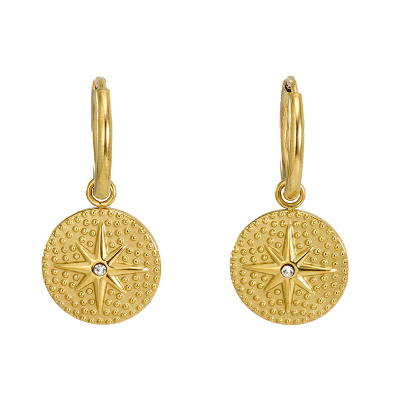 Elba Starburst Hoop Earrings in 18k gold plated stainless steel with star pendant and white stone