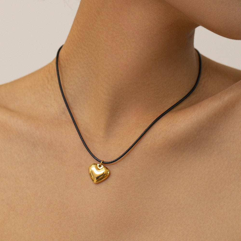 Romantic gold heart necklace with leather chain, modern jewelry gift