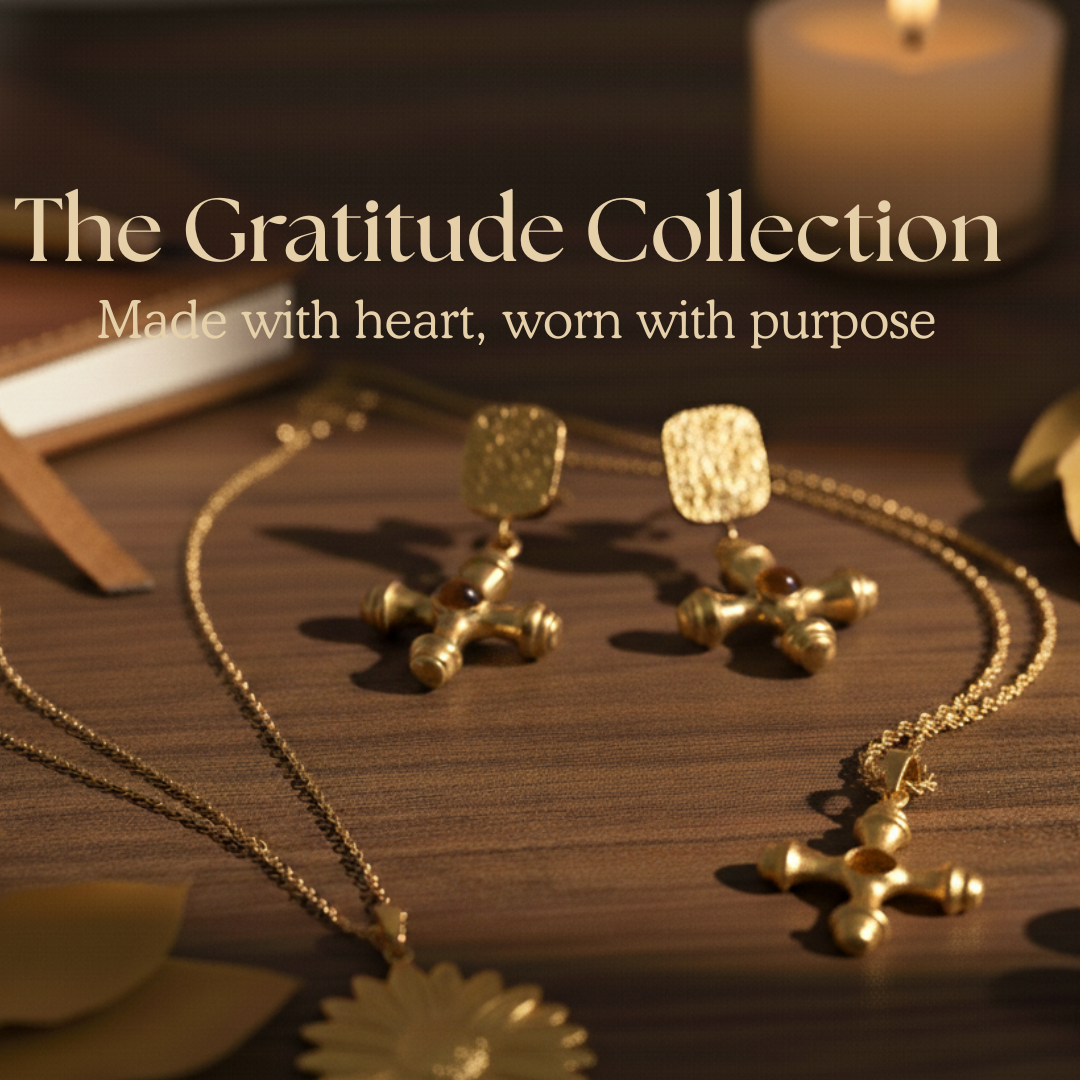 Gratitude Collection display featuring a cross necklace and matching earrings with the message ‘Made with heart, worn with purpose.