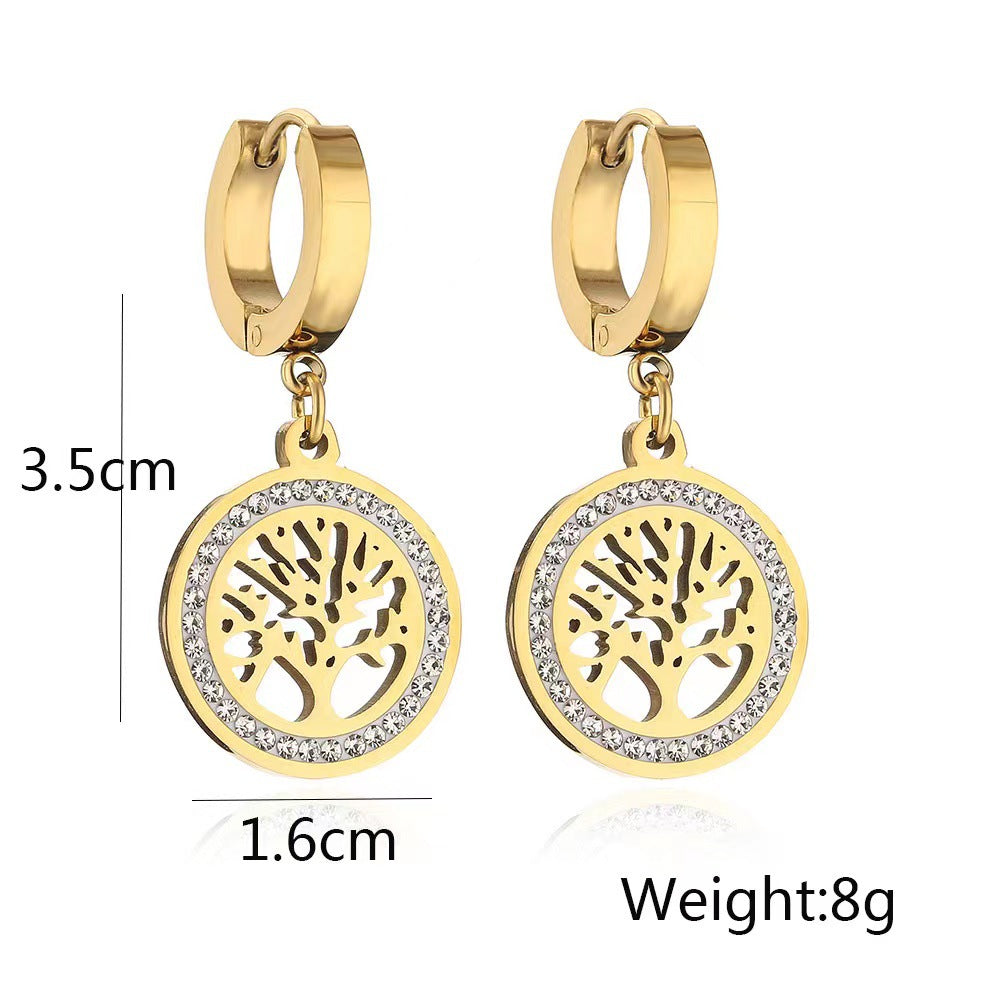 Gold Tree of Life earrings with diamond-cut finish, symbolic spiritual jewelry